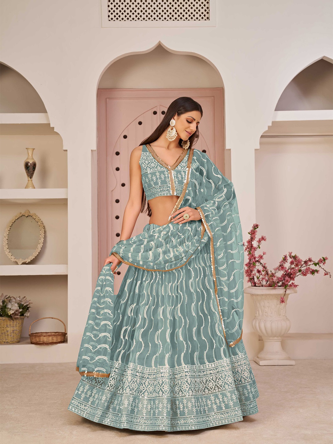 

Panzora Turquoise Blue Embroidered Sequinned Semi-Stitched Lehenga & Blouse With Dupatta