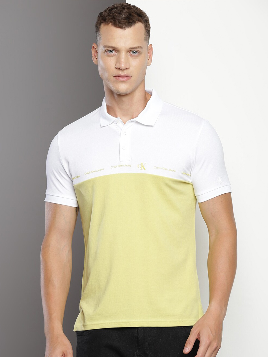 

Calvin Klein Jeans Colourblocked Polo Collar Cotton Slim Fit T-shirt, Yellow