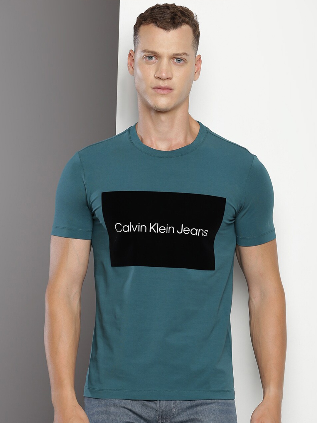 

Calvin Klein Jeans Typography Printed Cotton Slim Fit T-shirt, Teal