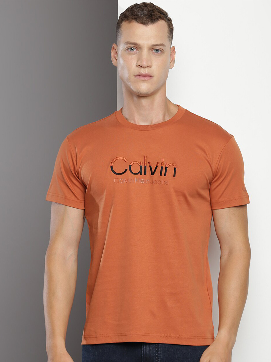 

Calvin Klein Jeans Typography Printed Cotton T-shirt, Rust