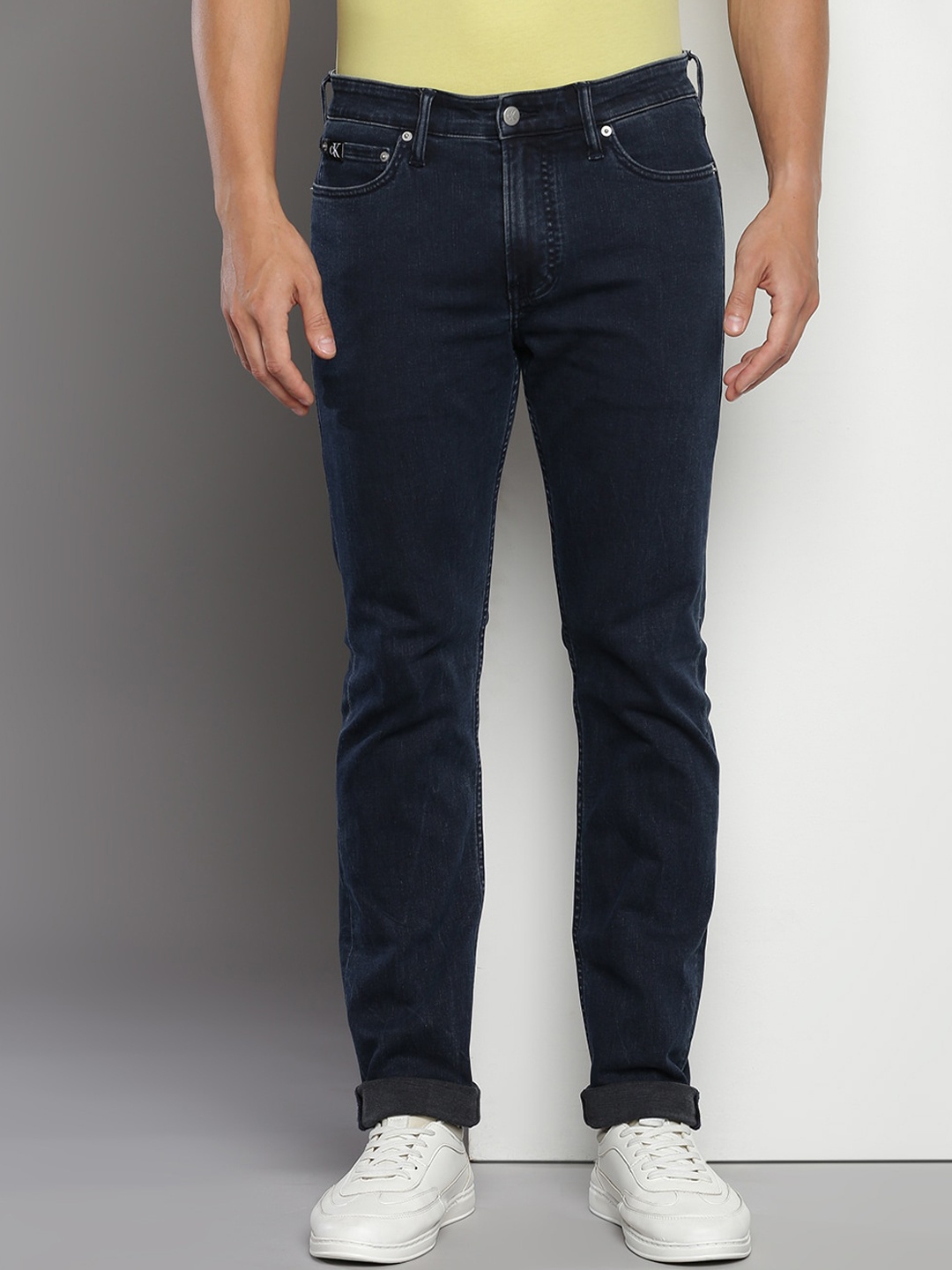 

Calvin Klein Jeans Men Mid-Rise Clean Look Stretchable Jeans, Blue