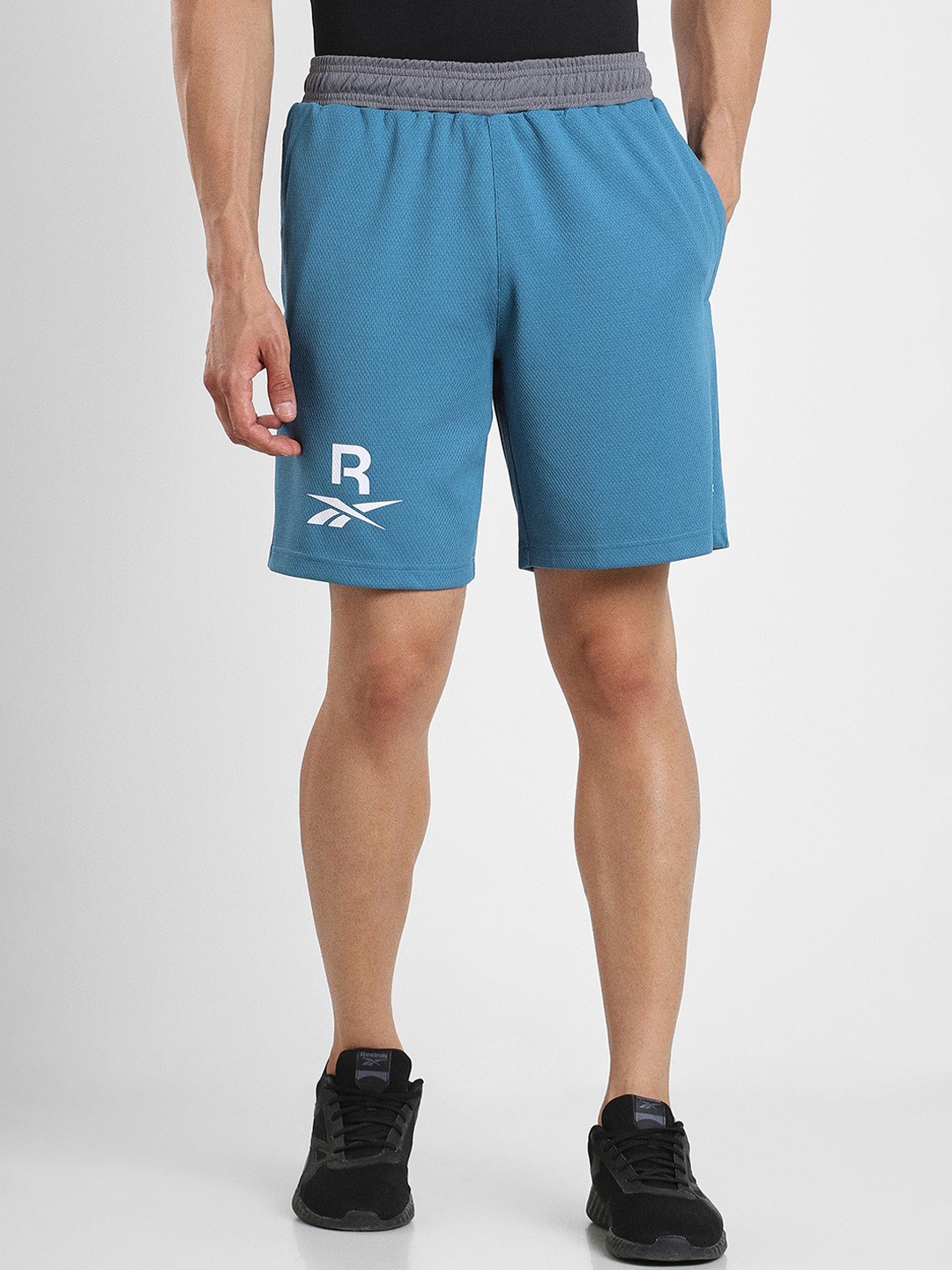 

Reebok Men Mid-Rise Speedwick Sports Shorts, Blue