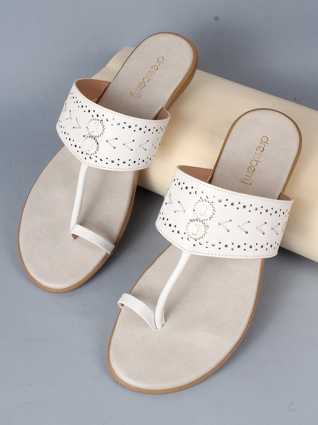 

DressBerry White Textured One Toe Flats With Laser Cuts