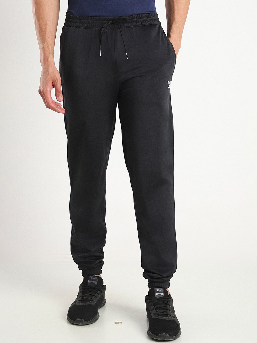 

Reebok Men Slim-Fit Mid-Rise Sports Joggers, Black