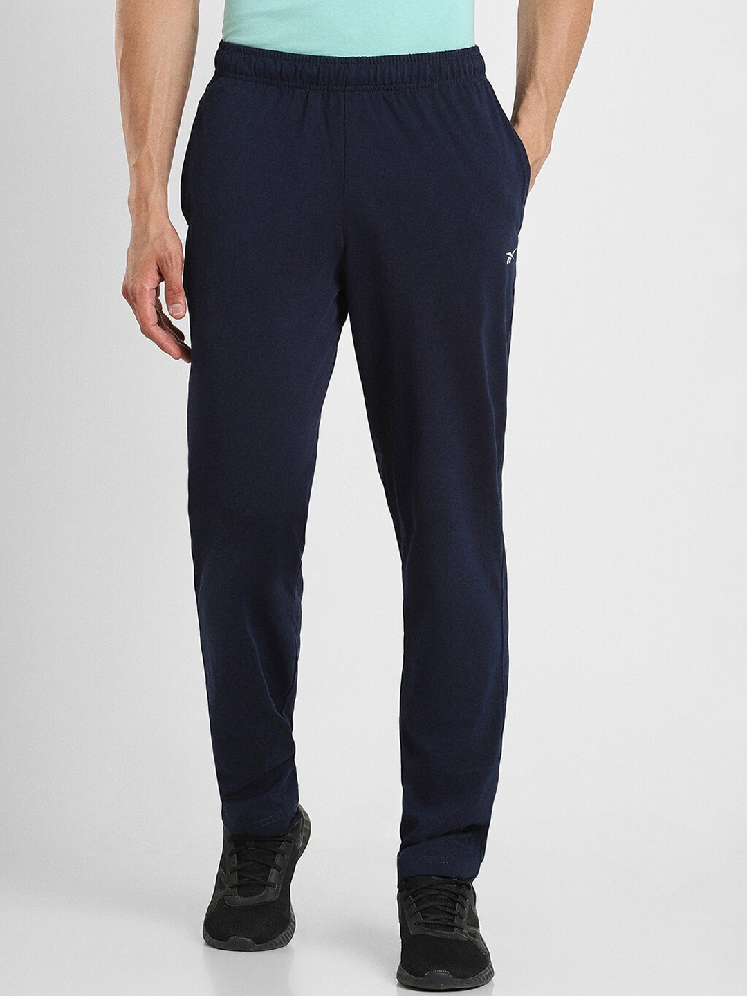 

Reebok Men Slim-Fit Mid-Rise Sports Track Pants, Navy blue