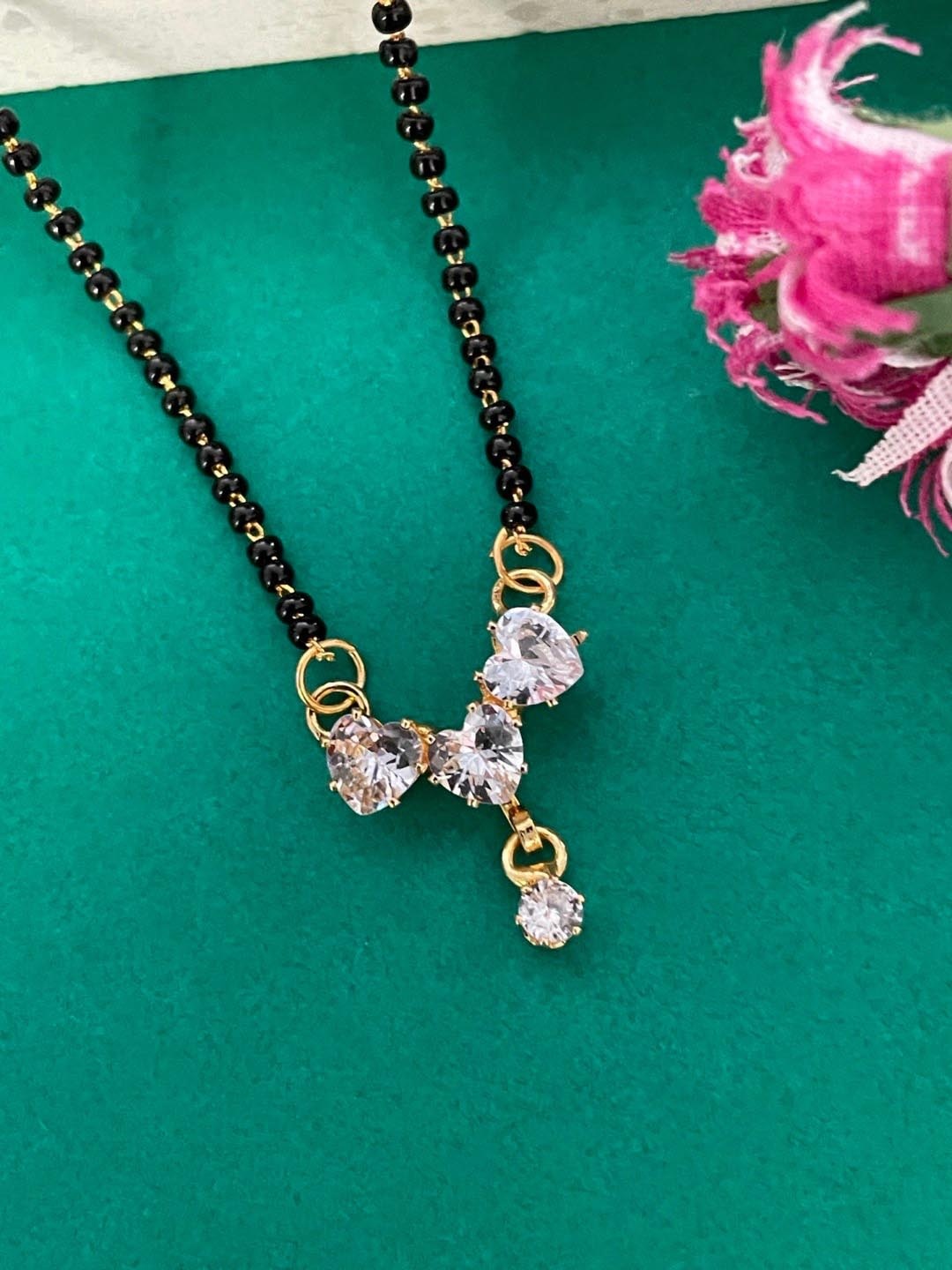 

Digital Dress Room Gold Plated American Diamond Studded & Beaded Mangalsutra