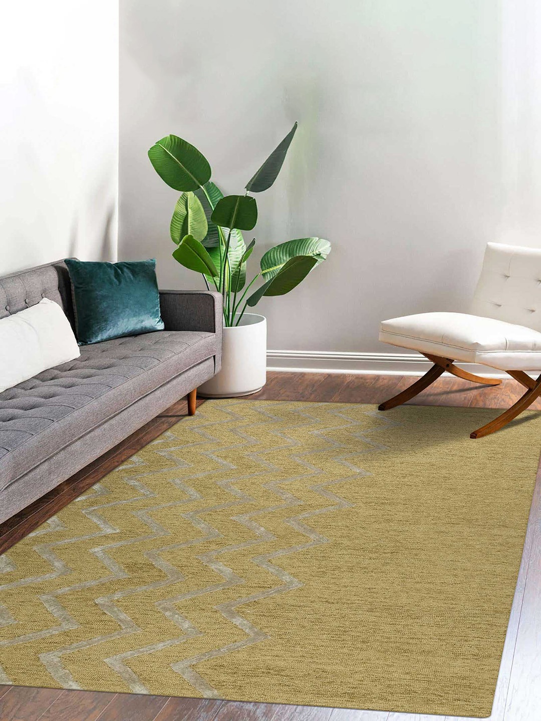 

saraswatii global Beige Self-Designed Rectangular Carpet