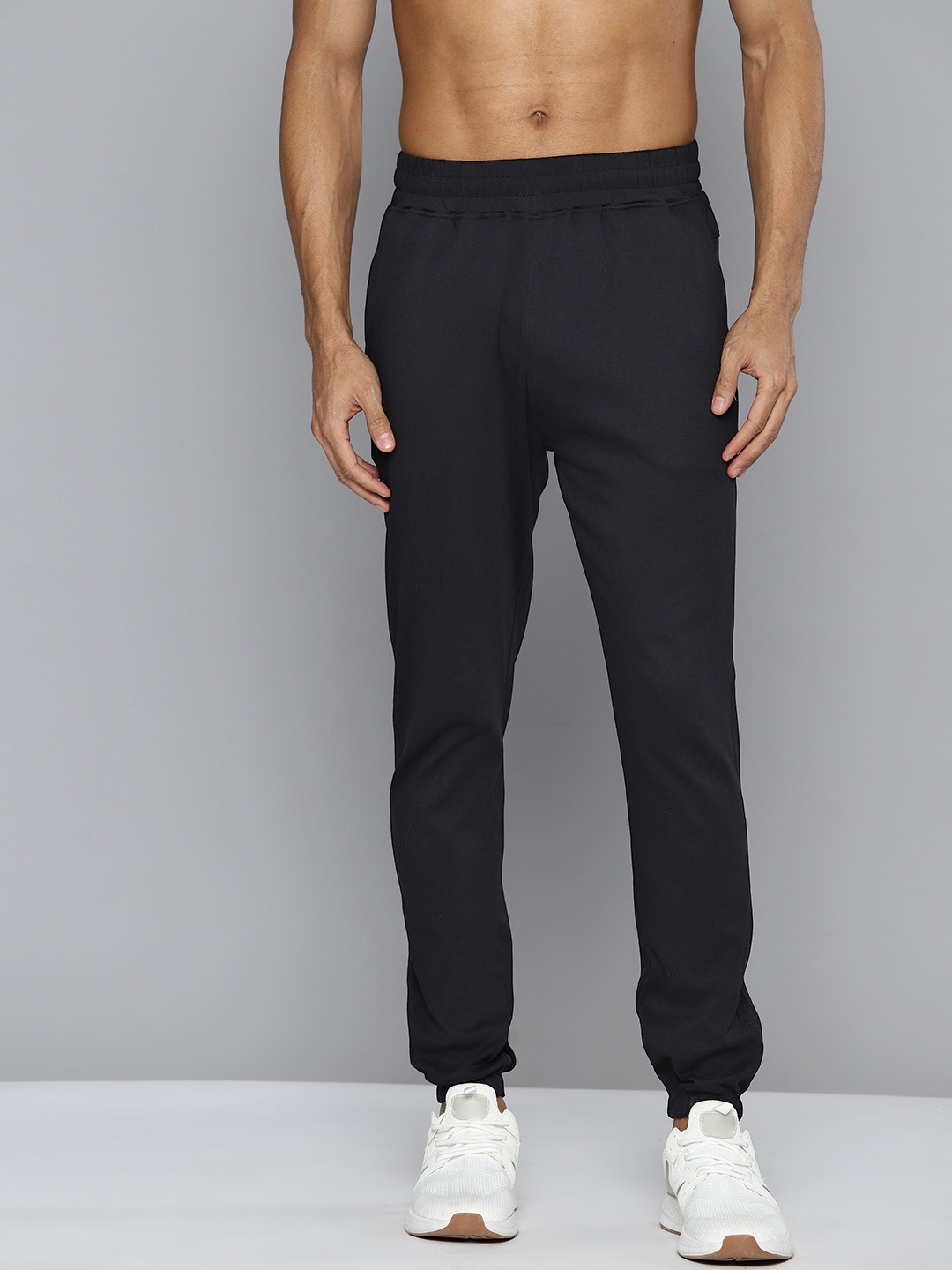 

HRX By Hrithik Roshan Men Solid Regular Fit Cotton Bio Wash Joggers, Black