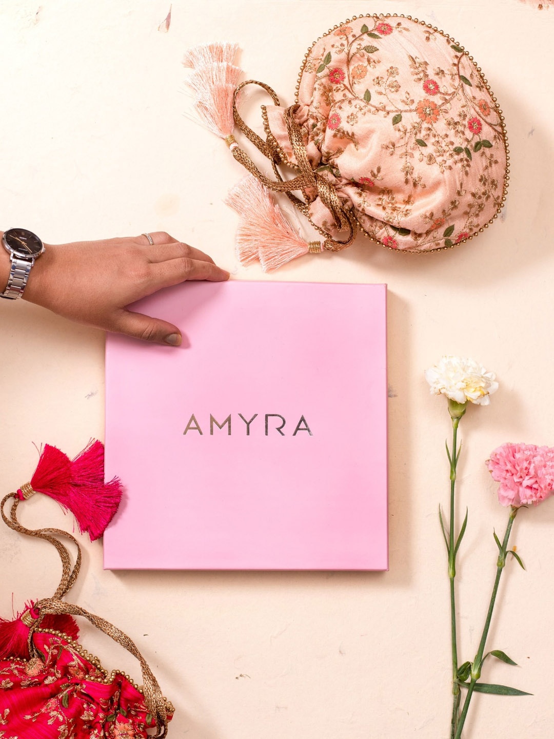 

AMYRA Floral Embroidered Tasselled Potli, Peach