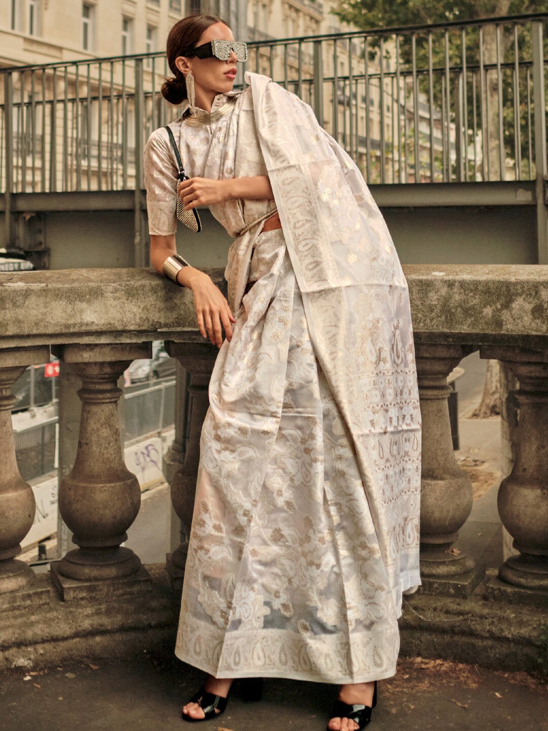 

Mitera White & Gold-Toned Ethnic Motifs Woven Design Zari Organza Muga Saree