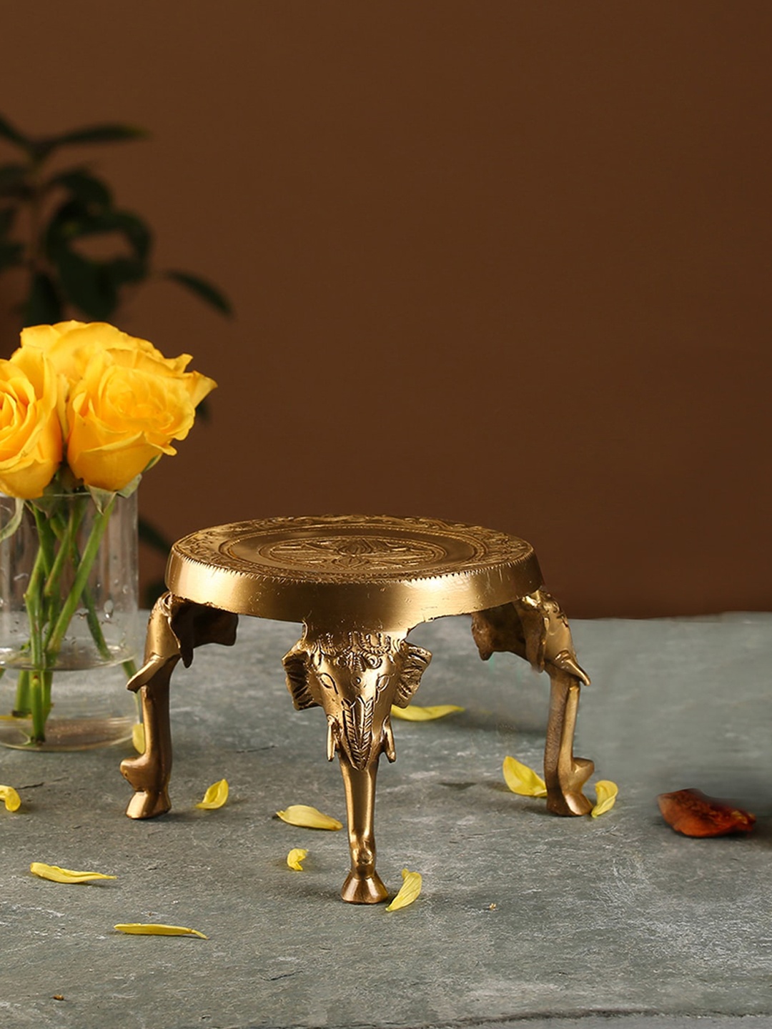 

Two Moustaches Gold Toned Elephant Pillars Design Brass Pooja Chowki