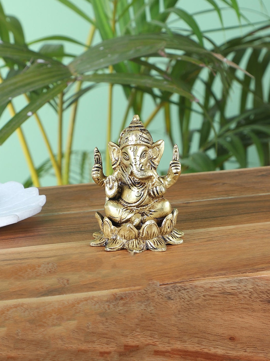 

Two Moustaches Gold Toned Brass Ganesha on Lotus Showpiece