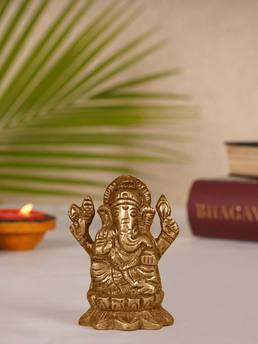 

ecofynd Gold-Toned Textured Lord Ganesha Idol Showpiece
