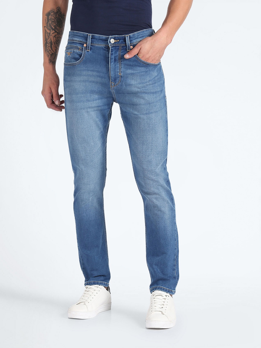 

Flying Machine Men Tapered Fit Heavy Fade Mid Rise Jeans, Blue