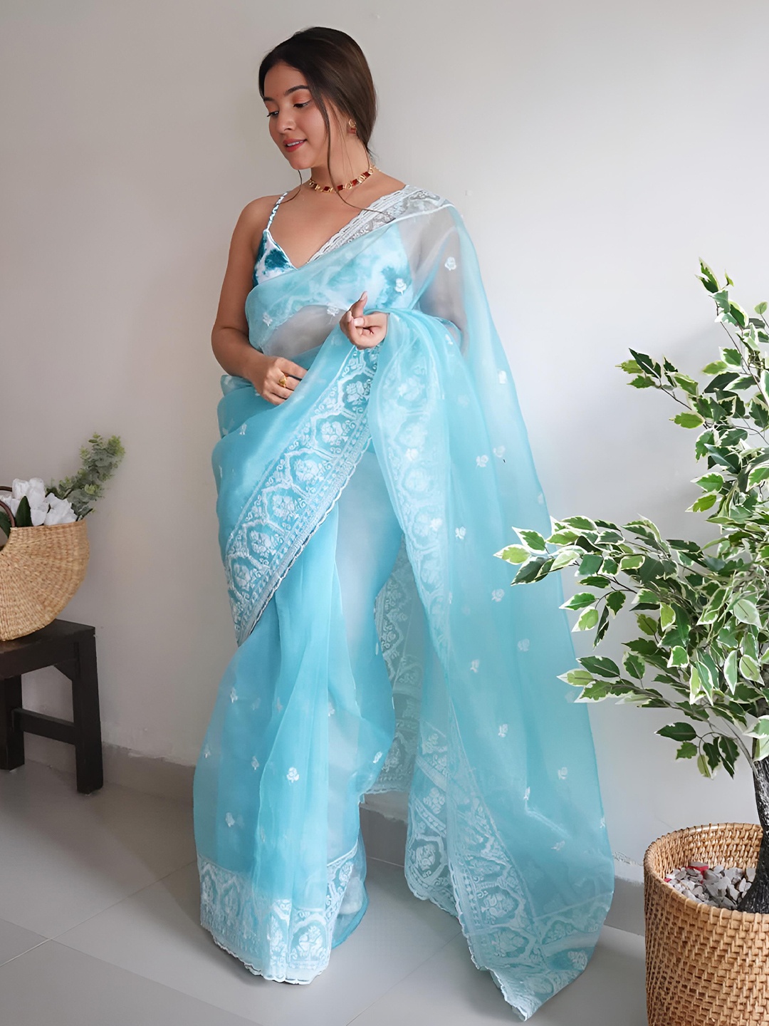 

Anouk Blue Ethnic Motifs Embroidered Organza Saree