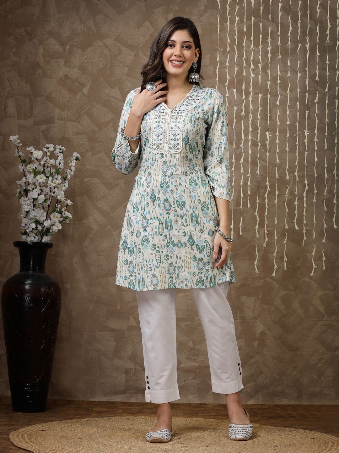 

Nayam By Lakshita Green Ethnic Motifs Printed V-Neck Thread Work Thread Work Kurti