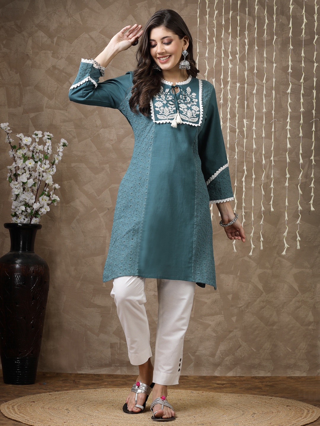 

Nayam By Lakshita Teal Floral Yoke Design Thread Work Pure Cotton Thread Work Kurti