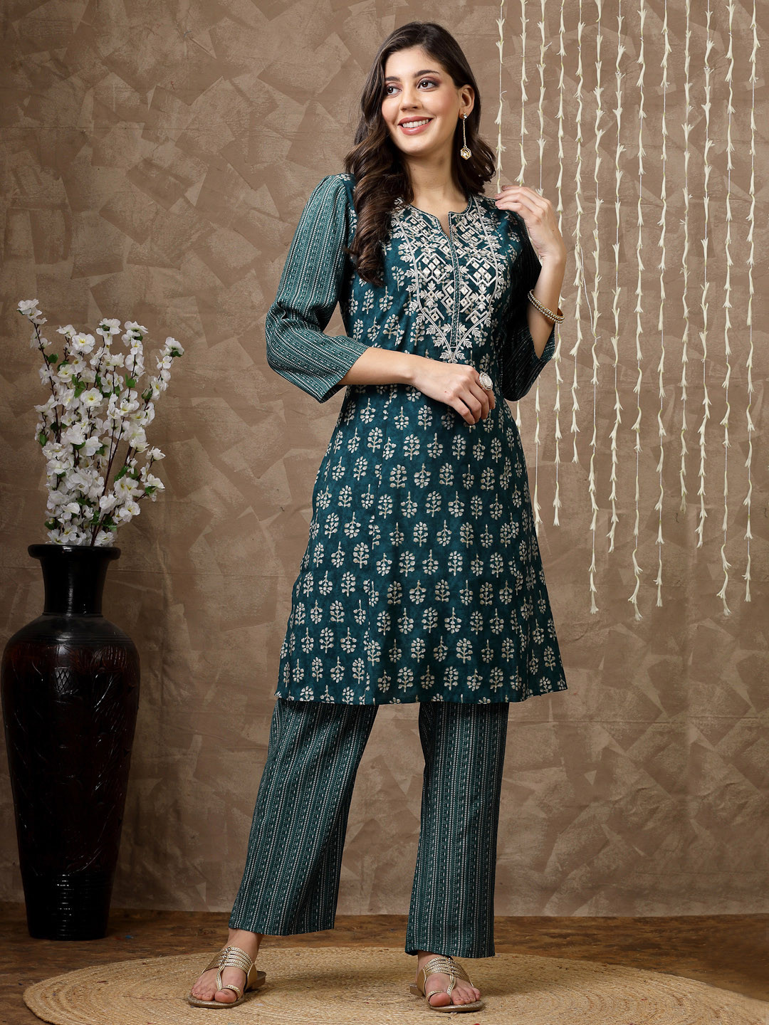 

Nayam By Lakshita Women Teal Floral Yoke Design Regular Thread Work Chanderi Cotton Kurta with Palazzos