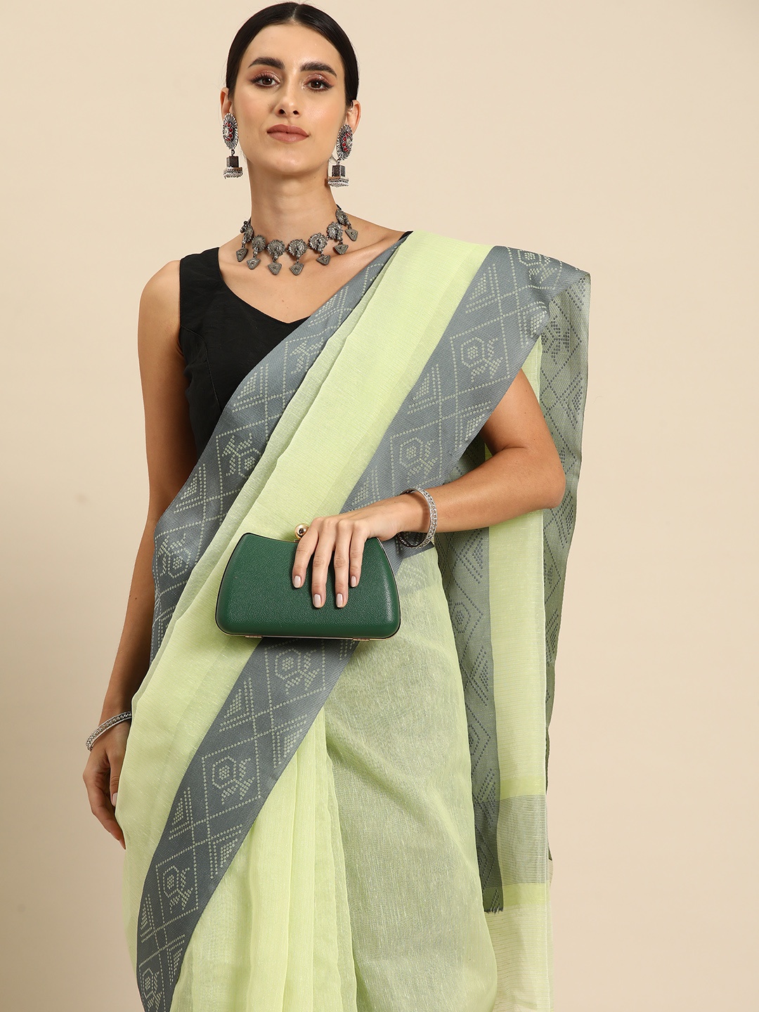 

Simaaya Solid Linen Blend Saree, Green