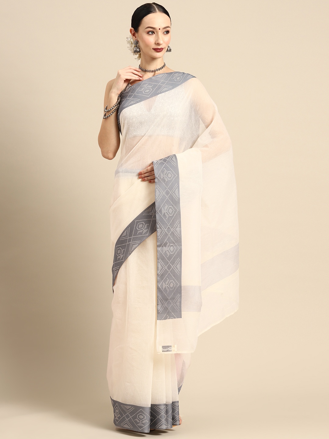 

Simaaya Solid Woven Design Saree, Cream
