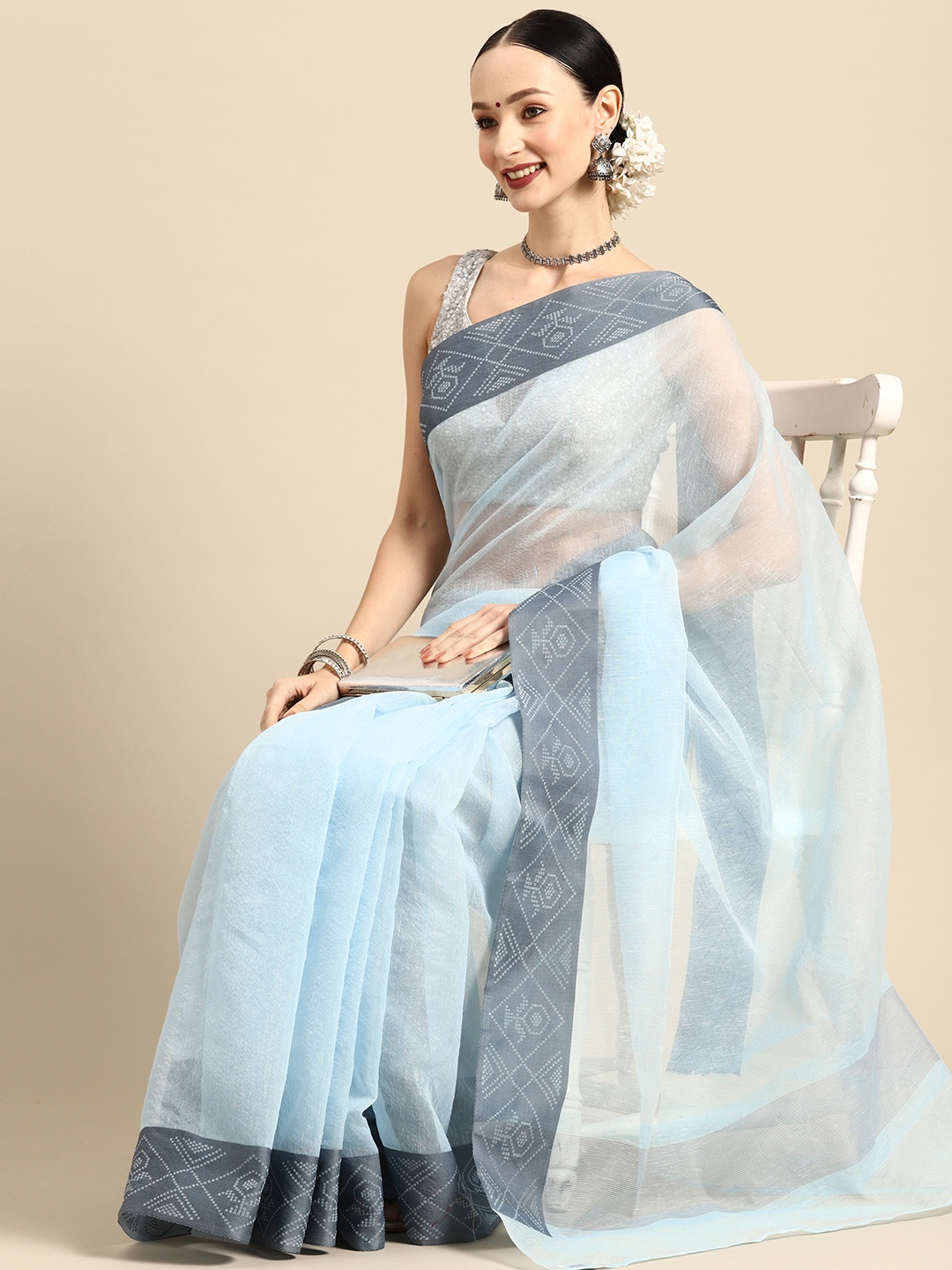 

Simaaya Solid Woven Design Saree, Blue