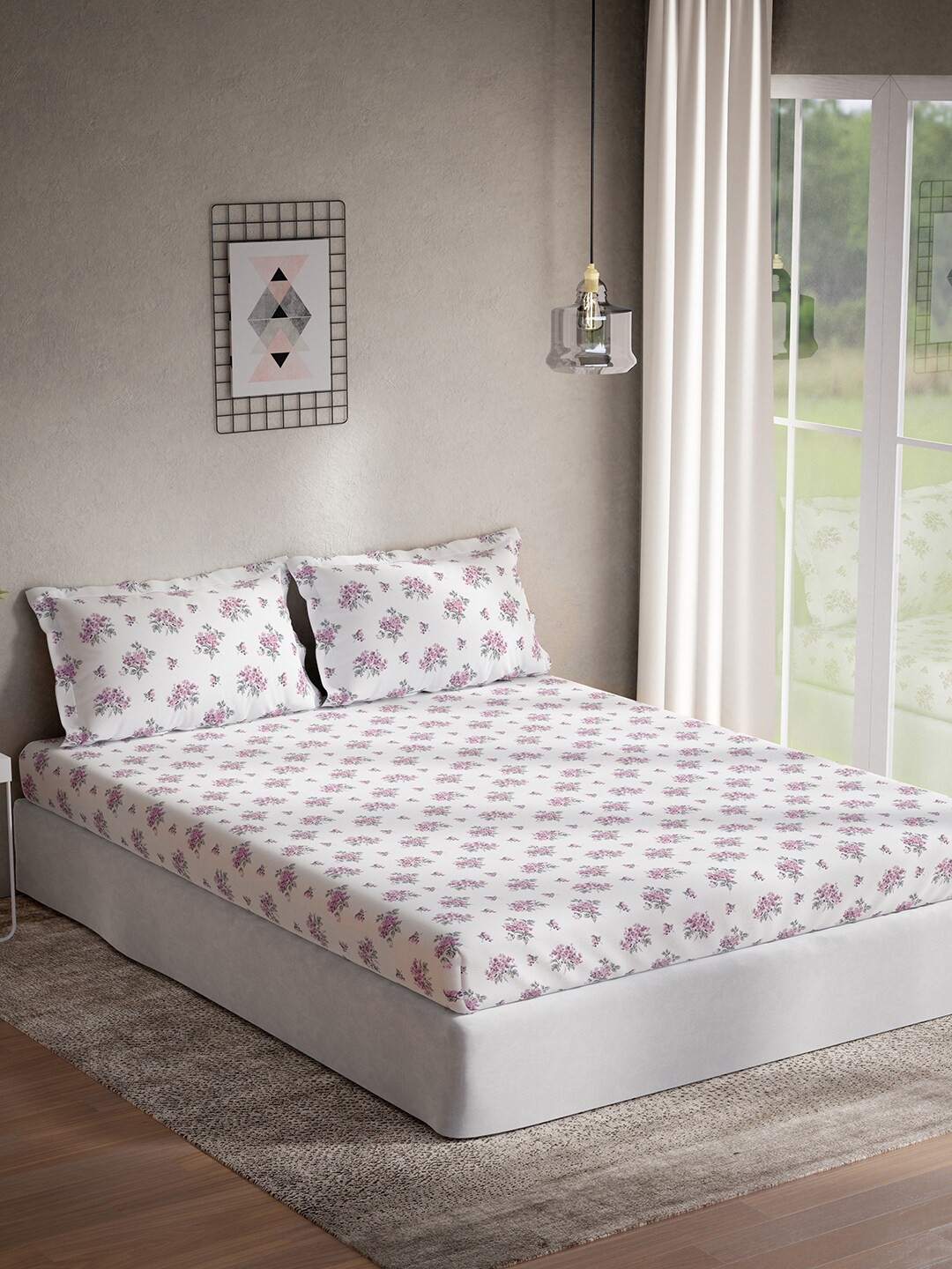 

DDecor Purple & White Floral Cotton 144 TC King Bedsheet With 2 Pillow Covers