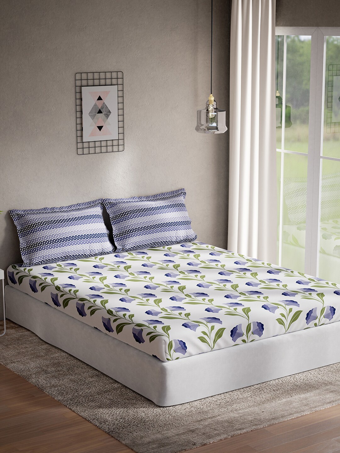 

DDecor Purple & White Floral Cotton 144 TC Queen Bedsheet With 2 Pillow Covers