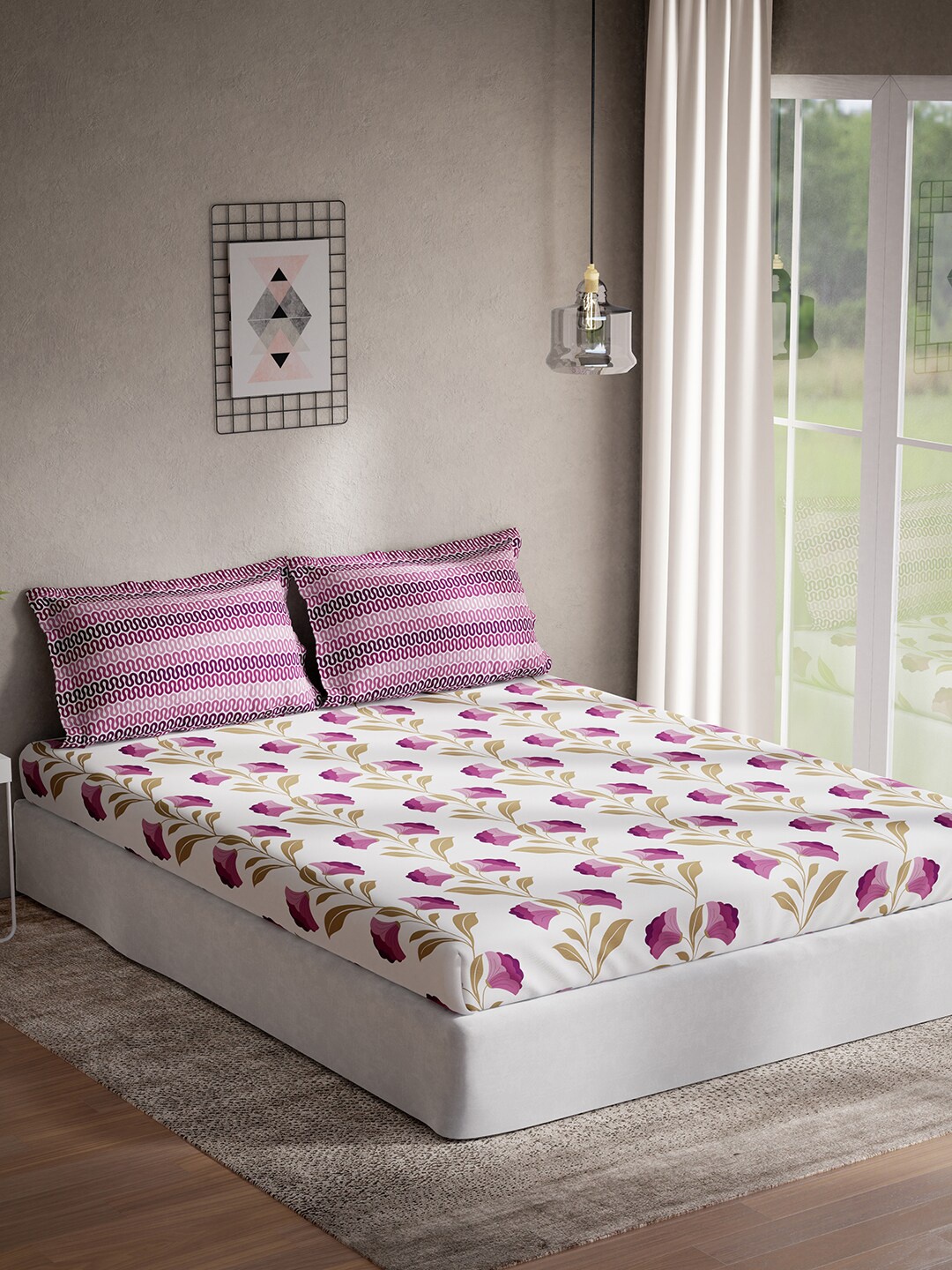 

DDecor Purple & White Floral Cotton 144 TC Queen Bedsheet With 2 Pillow Covers