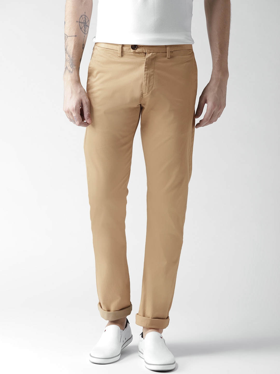 

Celio Men Beige Slim Fit Solid Regular Trousers