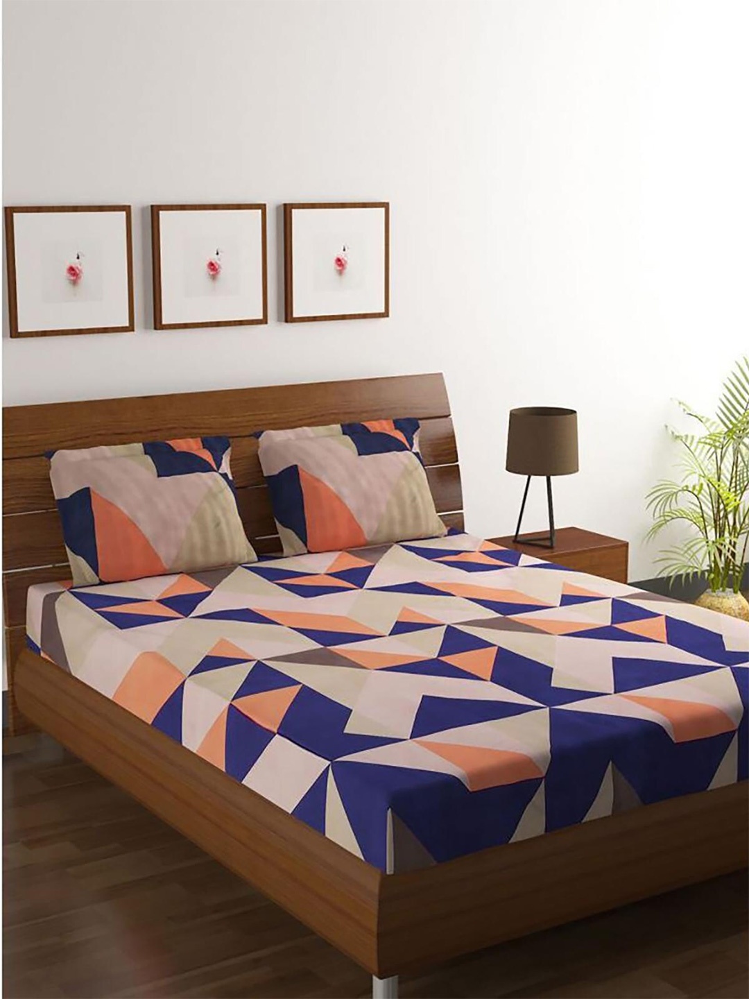 

HOMETALES Navy Blue & Peach-Coloured 128 TC Graphic Queen Bedsheet with 2 Pillow Covers