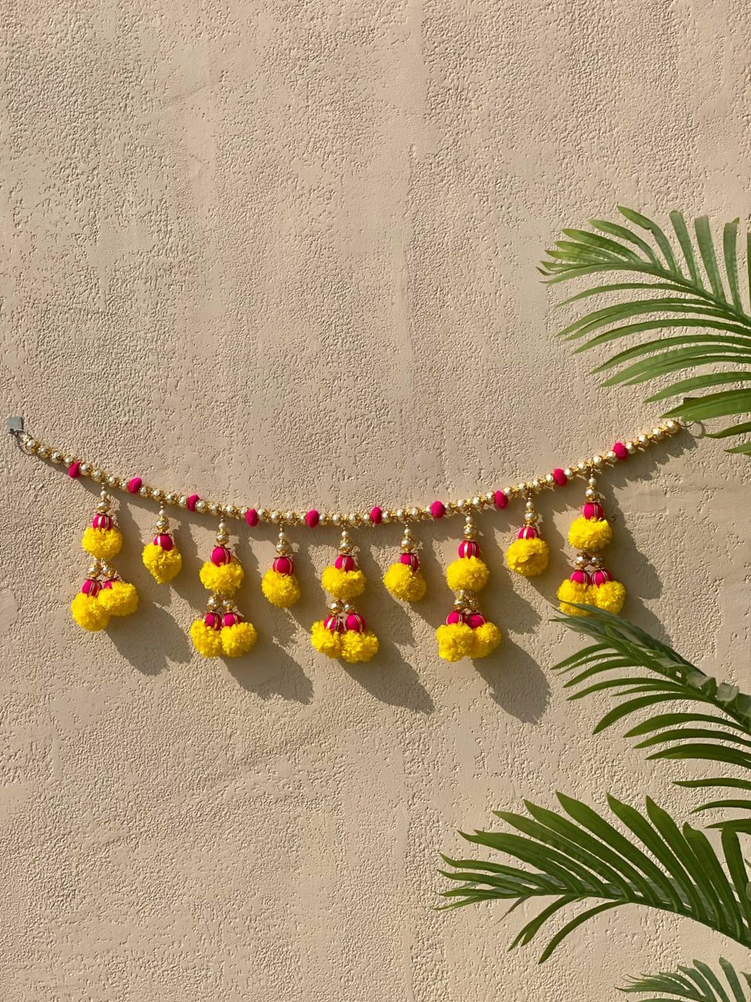 

Mason Home Yellow & Red Artificial Flower Toran