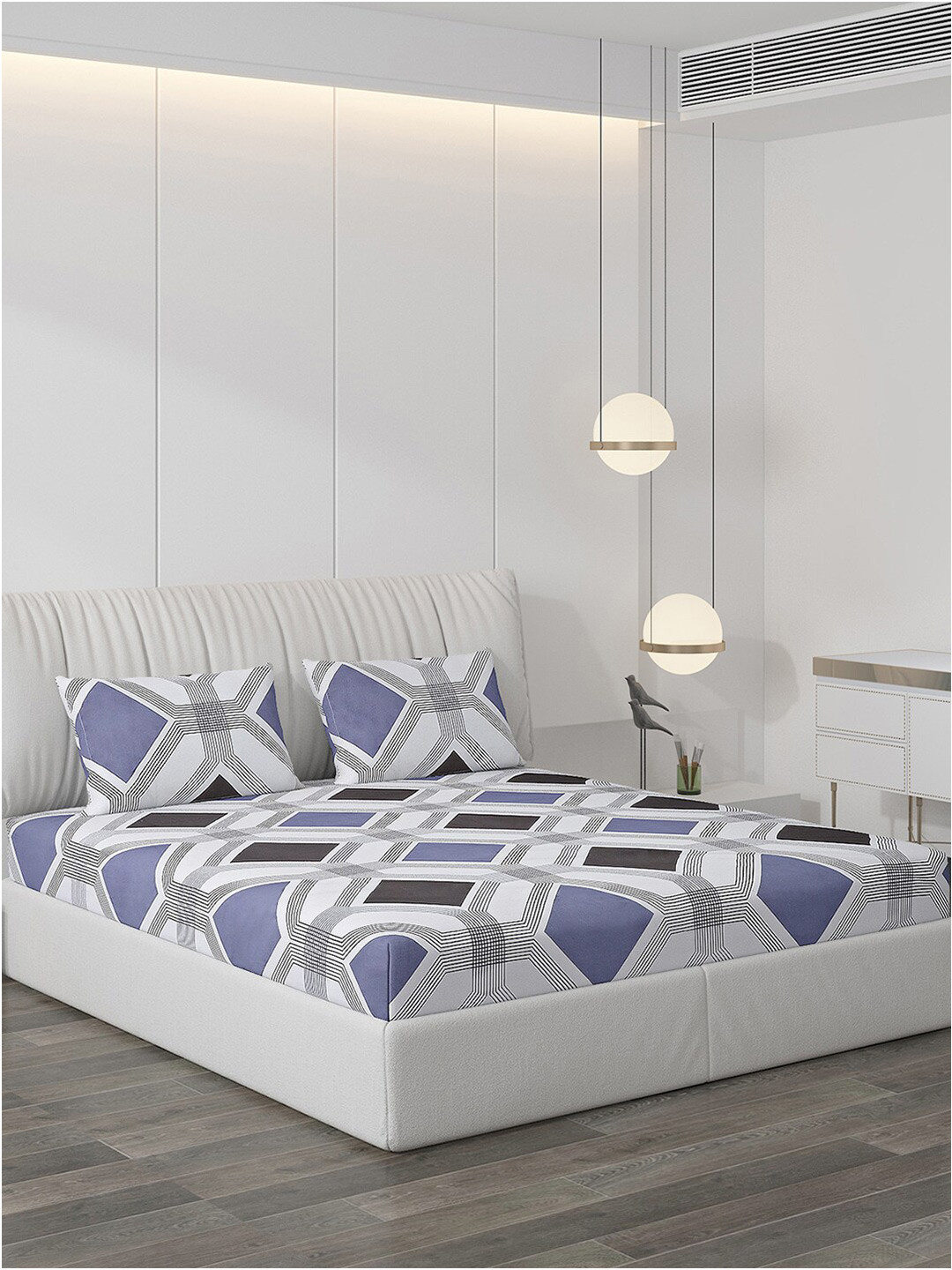 

Monte Carlo White & Blue Geometric 130 TC King Bedsheet with 2 Pillow Covers