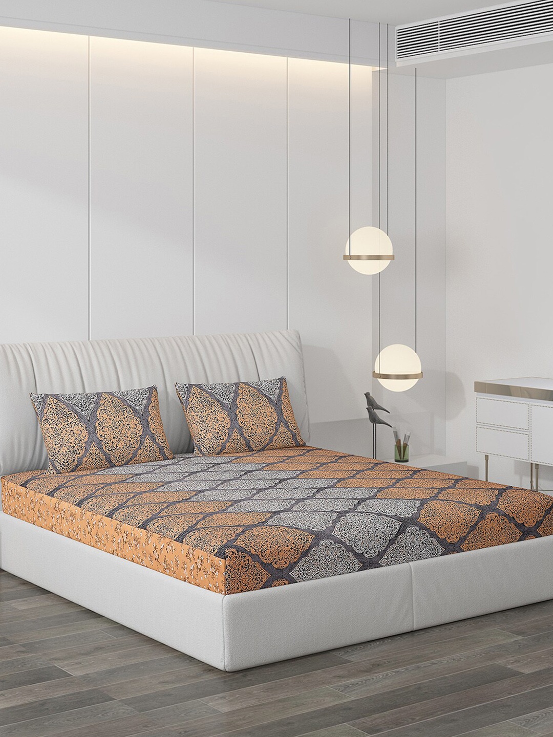 

Monte Carlo Baizo Grey & Orange Ethnic Motifs 120 TC King Bedsheet with 2 Pillow Covers