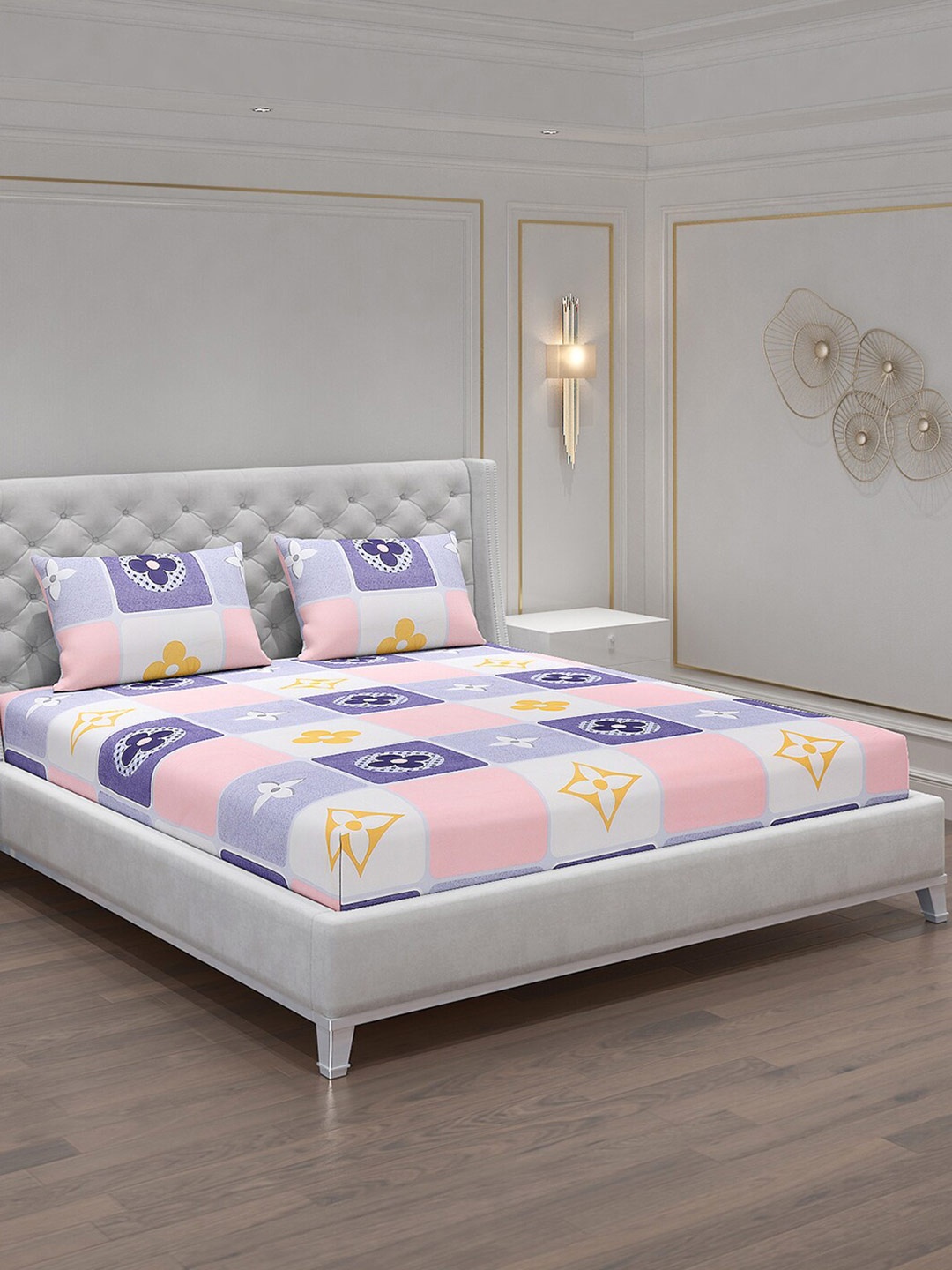 

Monte Carlo Pink & Purple Ethnic Motifs Printed 120 TC King Bedsheet with 2 Pillow Covers