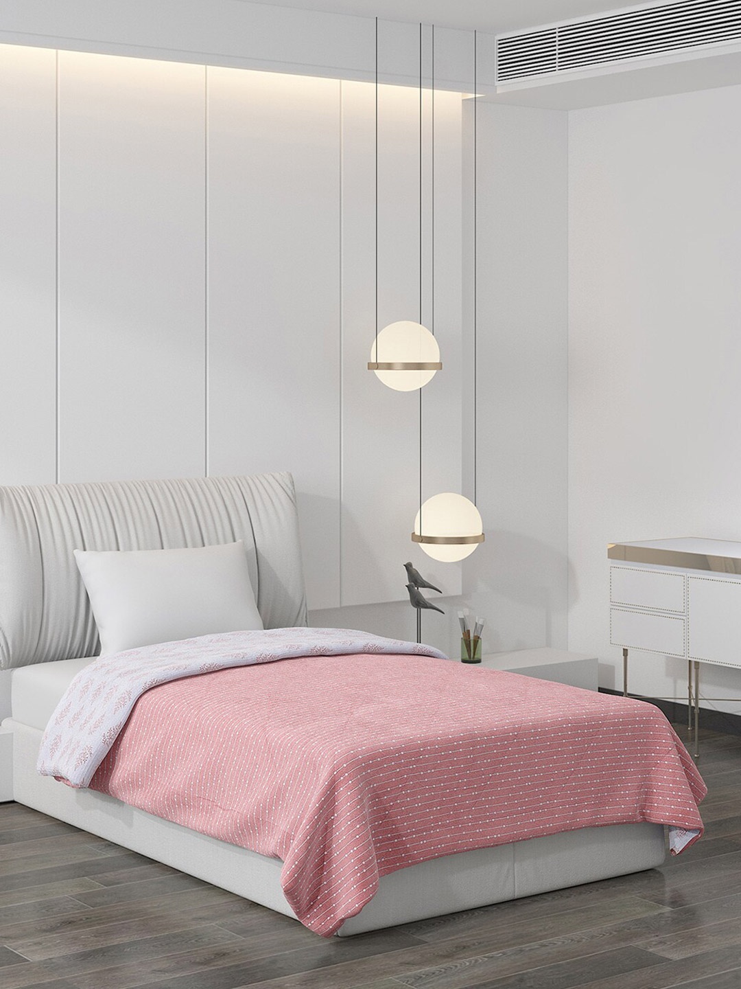 

Monte Carlo Pink & Blue Ethnic Motifs AC Room 120 GSM Single Bed Comforter