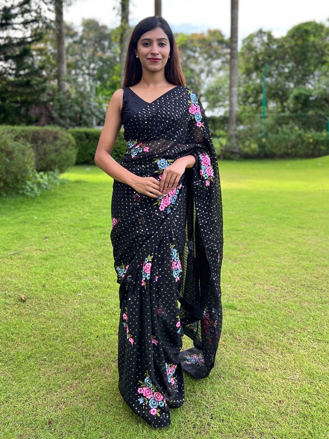 

Anouk Black Floral Embroidered Sequinned Pure Georgette Saree