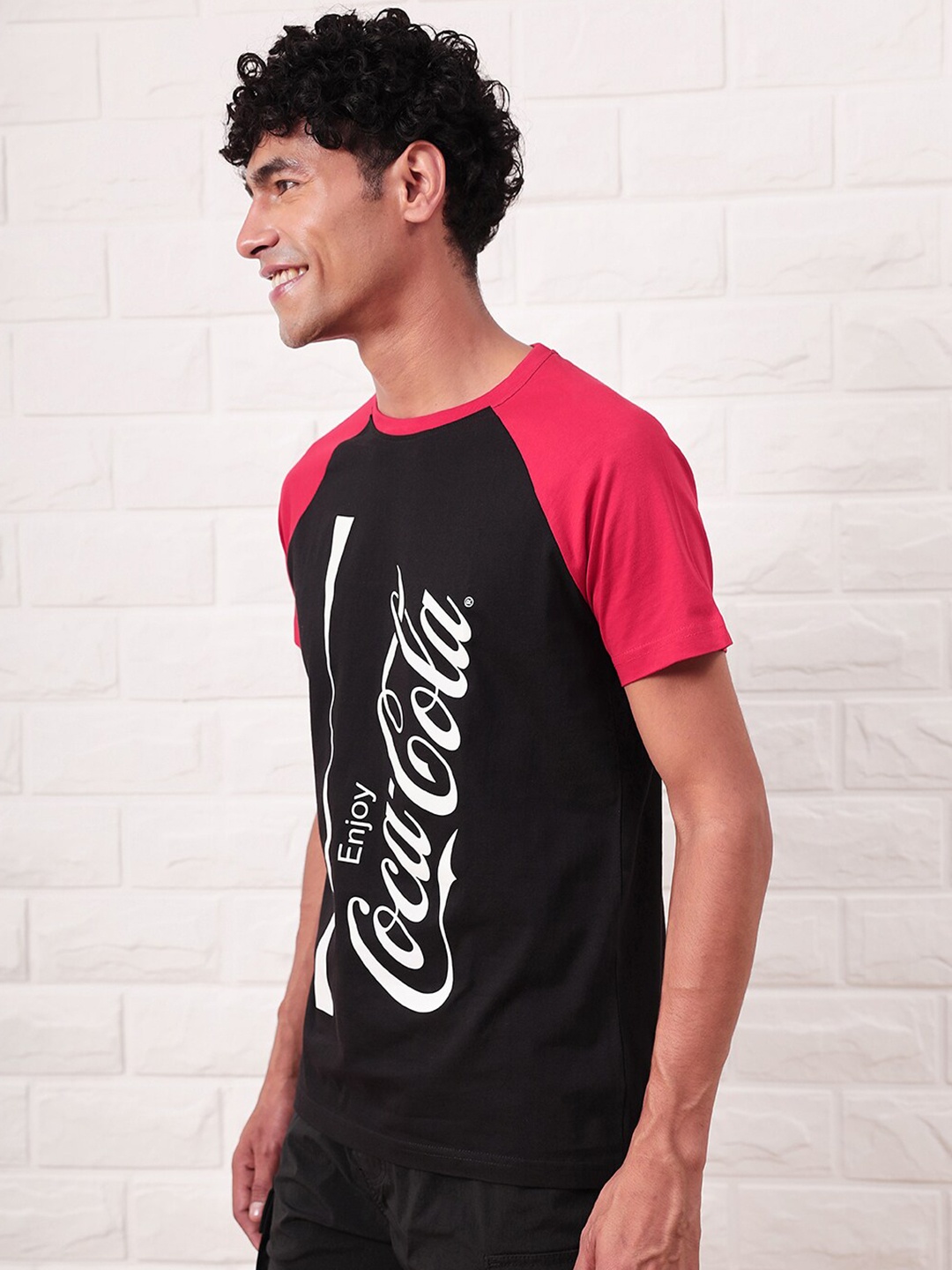 

Bewakoof Typography Printed Raglan Sleeves Cotton Regular T-shirt, Black