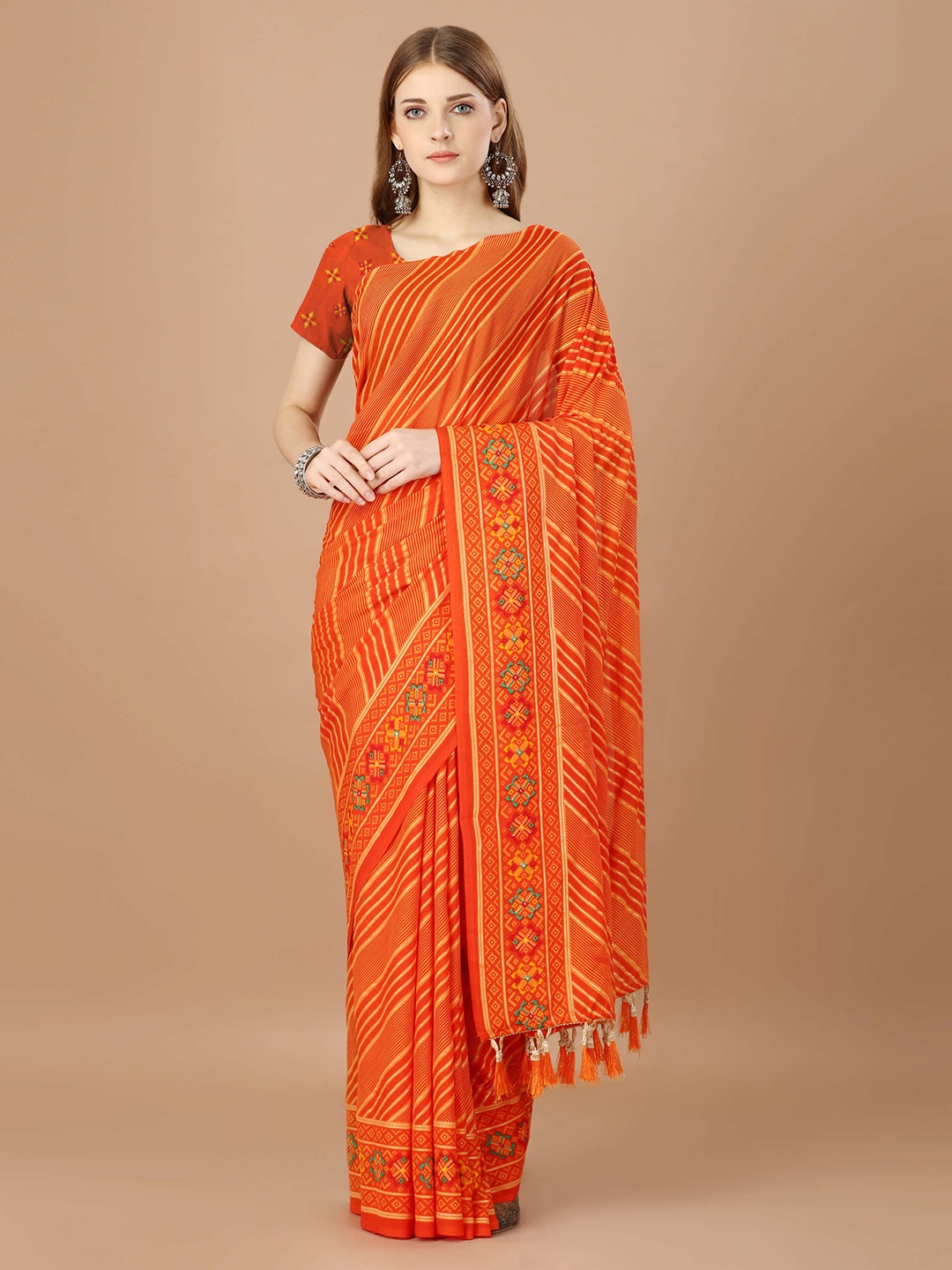 

Mitera Striped Pure Georgette Saree, Orange