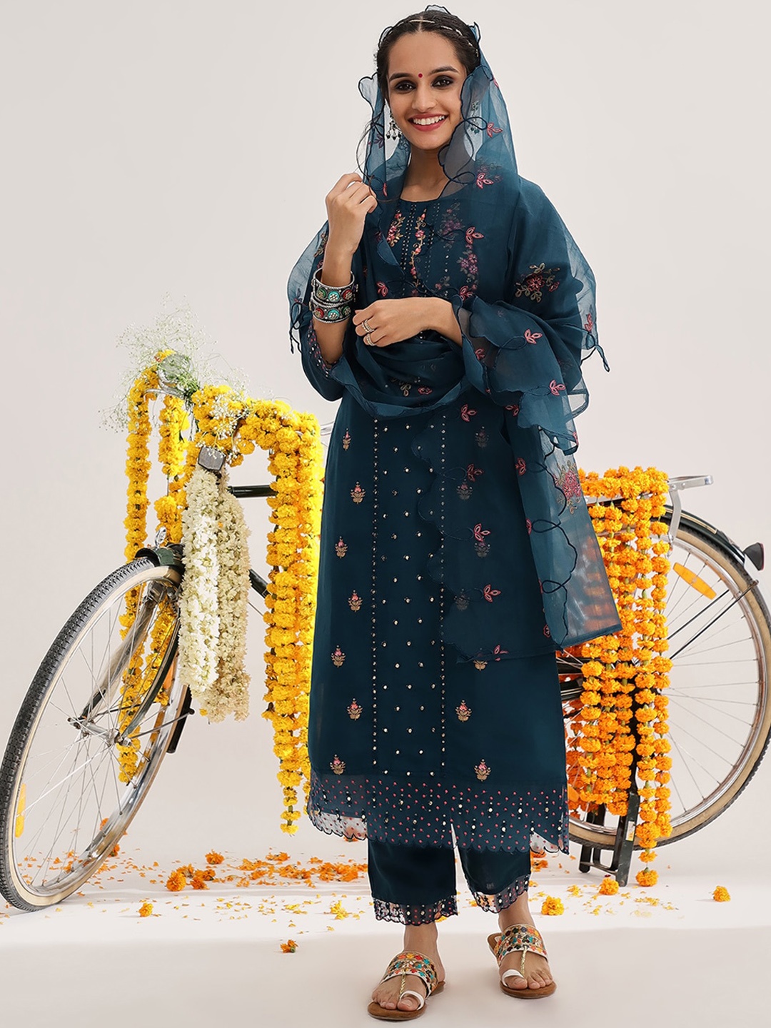 

Varanga Ethnic Motifs Embroidered Thread Work Detail Kurta & Trousers With Dupatta, Teal