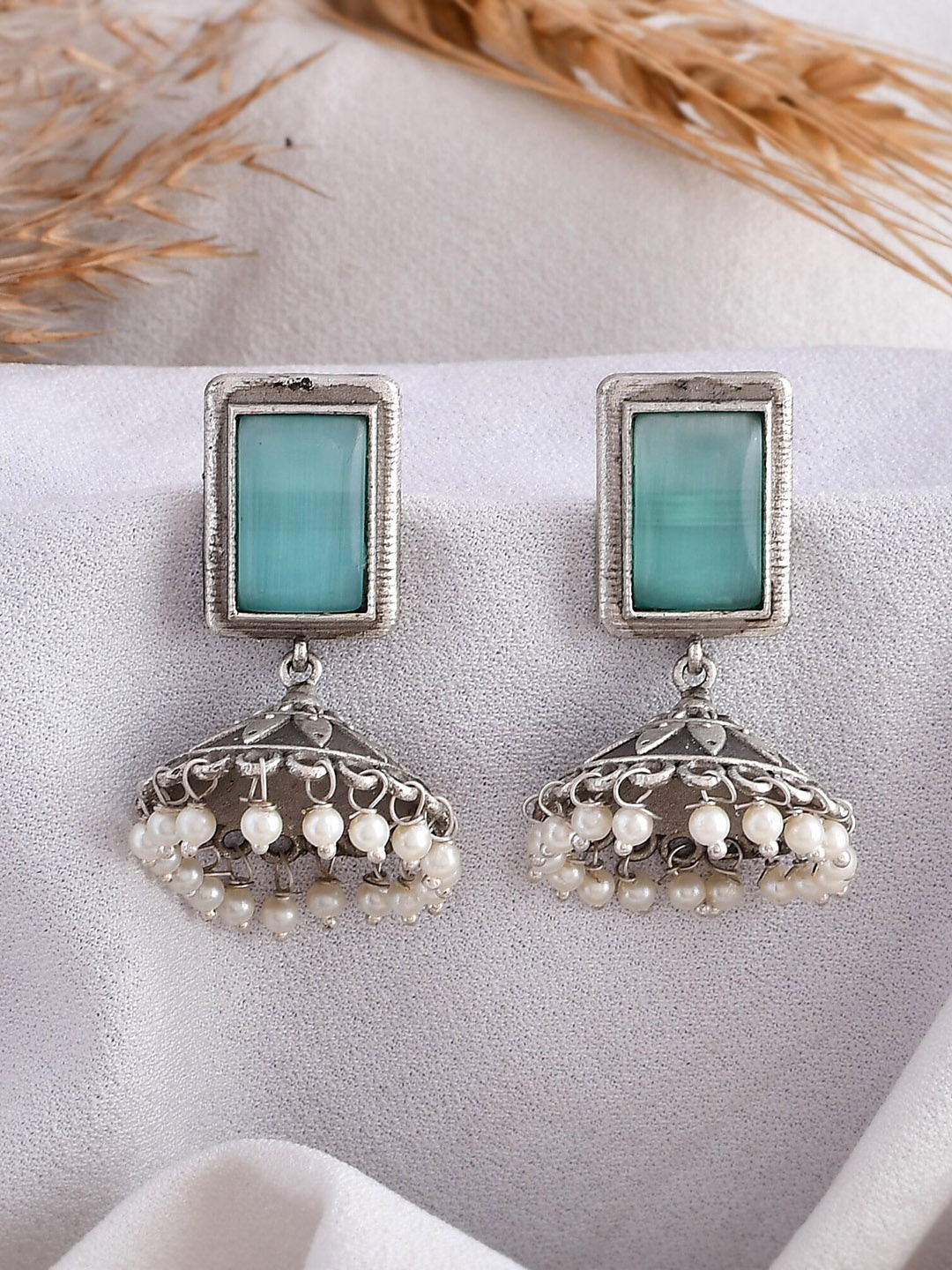 

DASTOOR Silver-Plated Contemporary Jhumkas Earrings