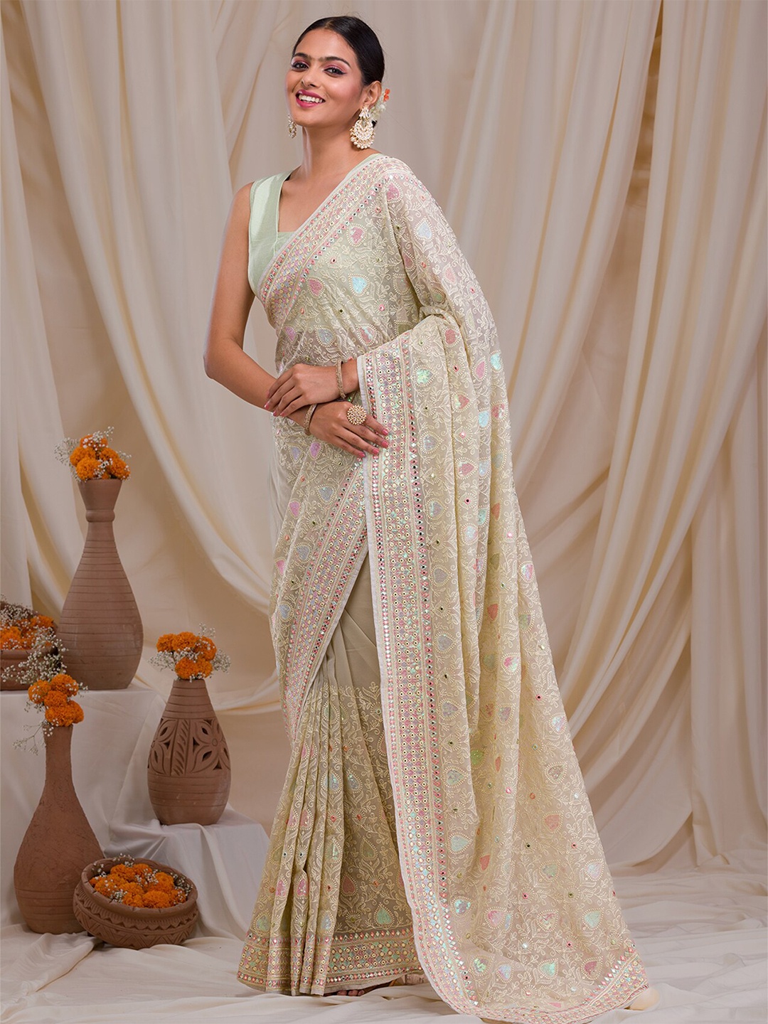 

Koskii Ethnic Motifs Embroidered Georgette Saree, Green
