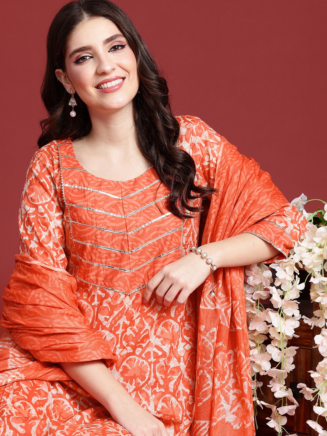 

Anouk Women Floral Printed Regular Gotta Patti Pure Cotton Kurta with Trousers & Dupatta, Orange