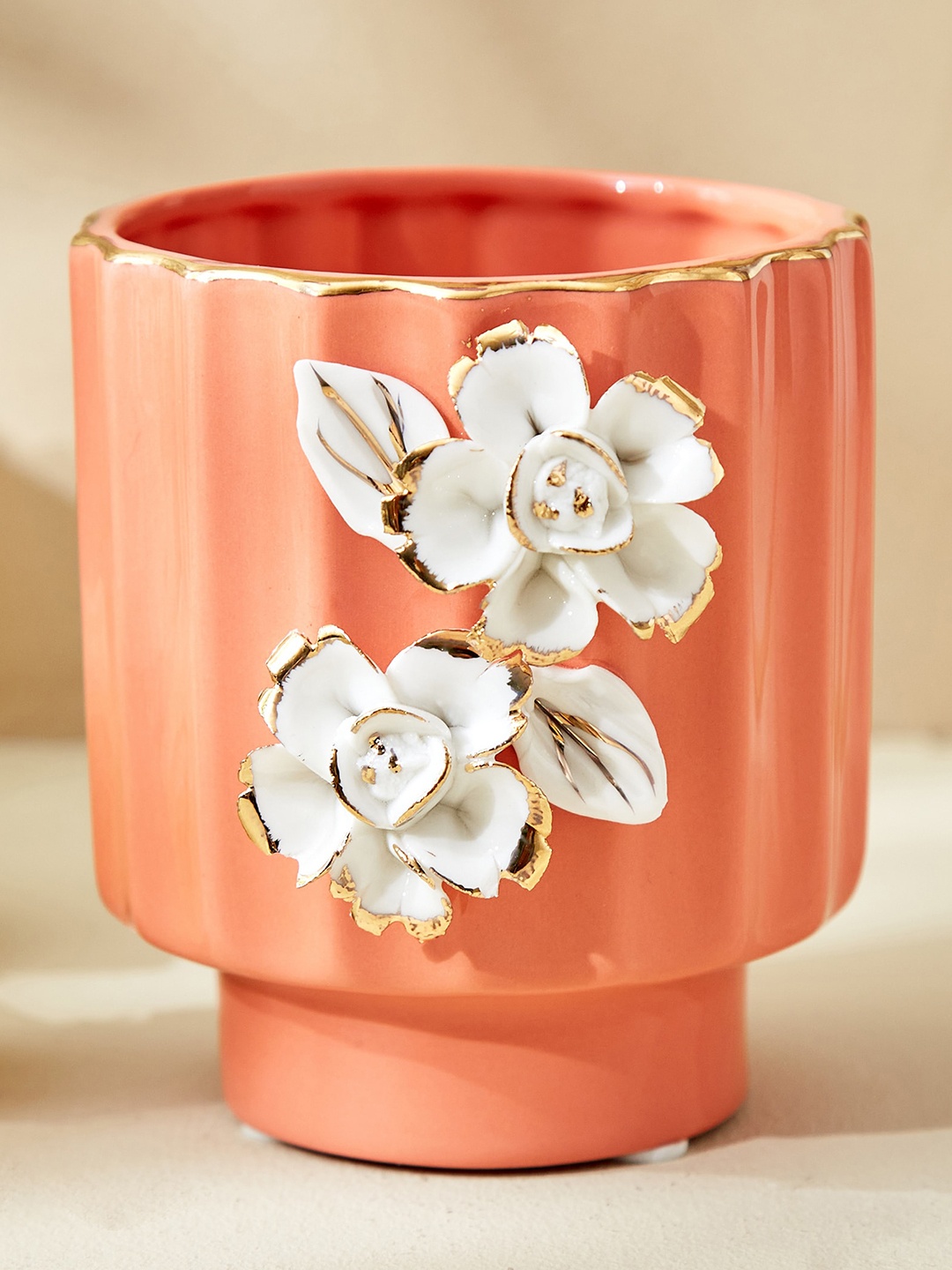 

Home Centre Peach Coloured & White Floral T-Light Candle Holder