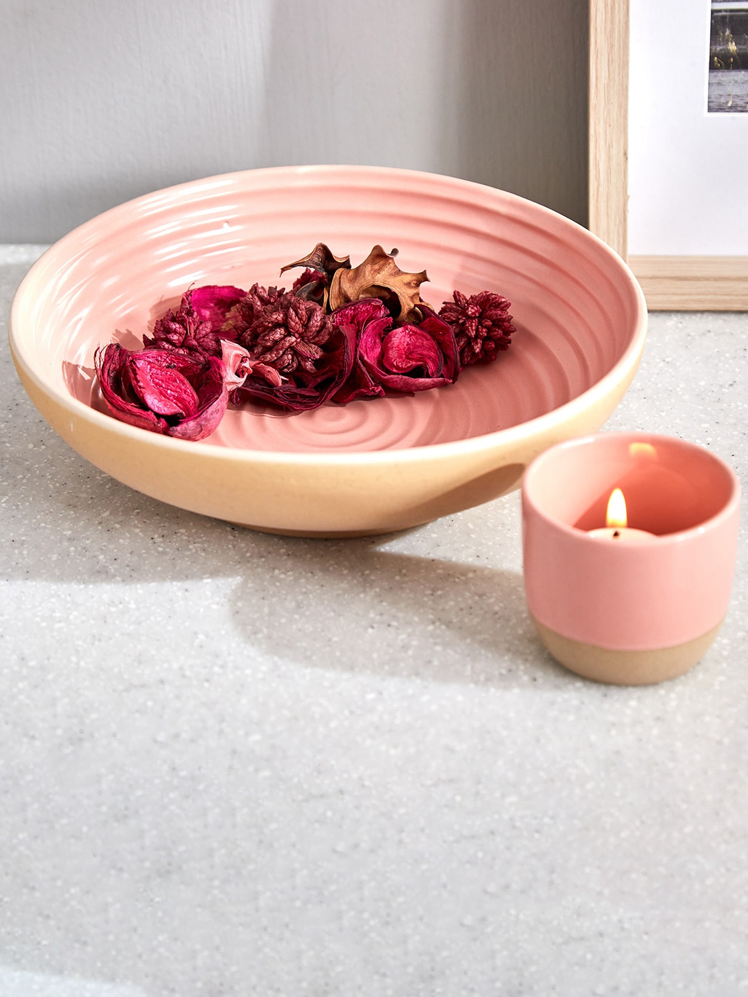 

Home Centre Peach Coloured Ceramic Votive Holder