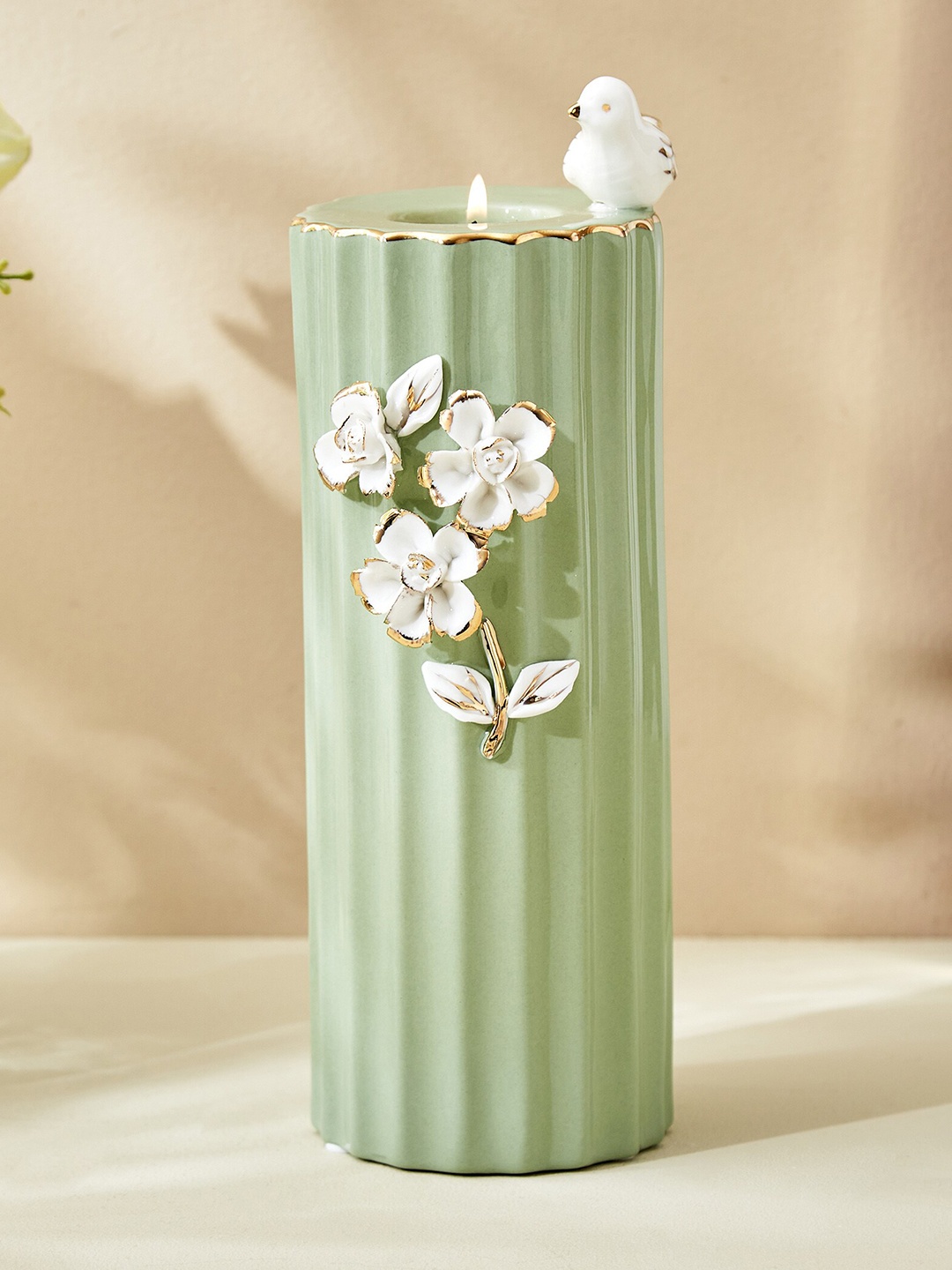

Home Centre Moksha Green & White Polyresin Floral Candle Holder