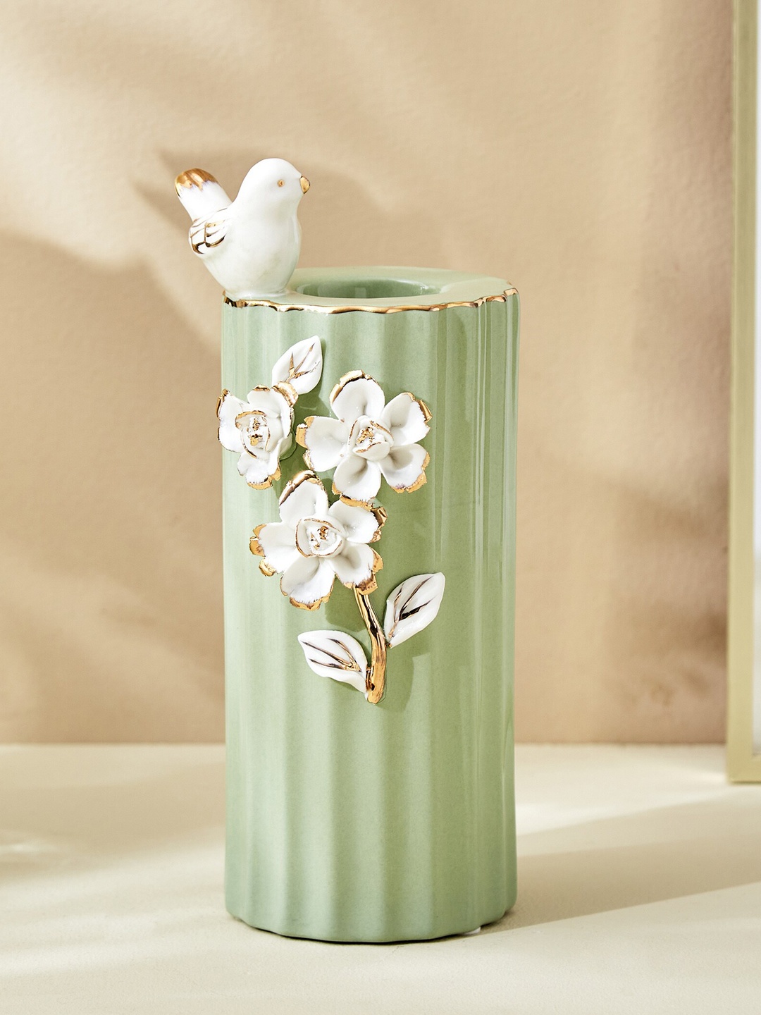 

Home Centre Green & White Textured Candle Holder