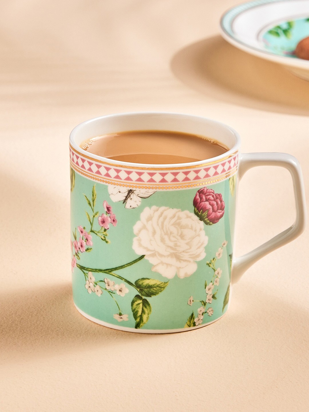 

Home Centre Green & Pink Floral Printed Bone China Matte Mug- 230ml