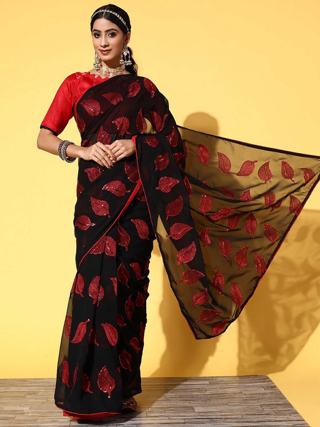 

Mitera Black & Red Embellished Pure Georgette Saree