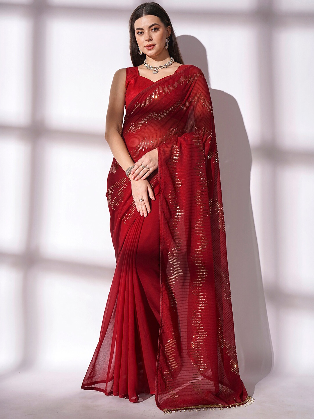 

Mitera Maroon Embellished Sequinned Pure Georgette Saree