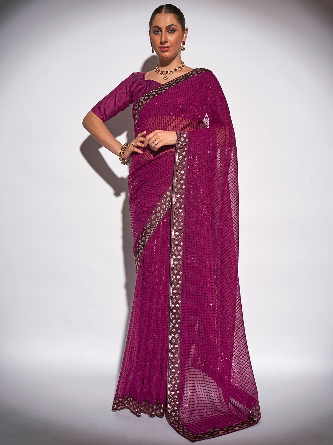 

Mitera Purple & Gold-Toned Embellished Sequinned Pure Georgette Saree